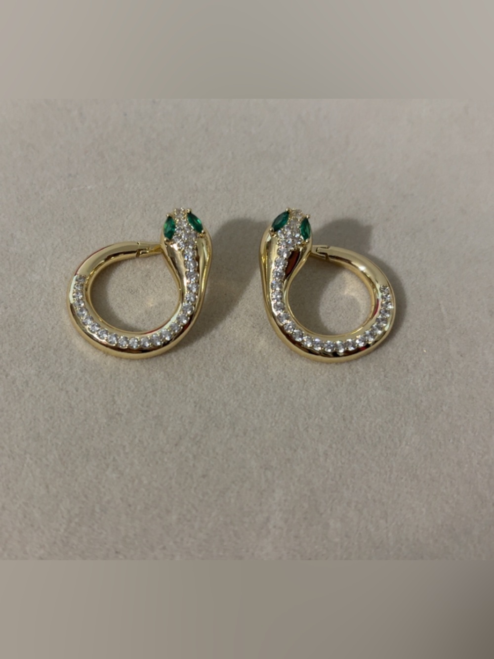 Gold-Tone Snake Hoop Earrings with Emerald Accent